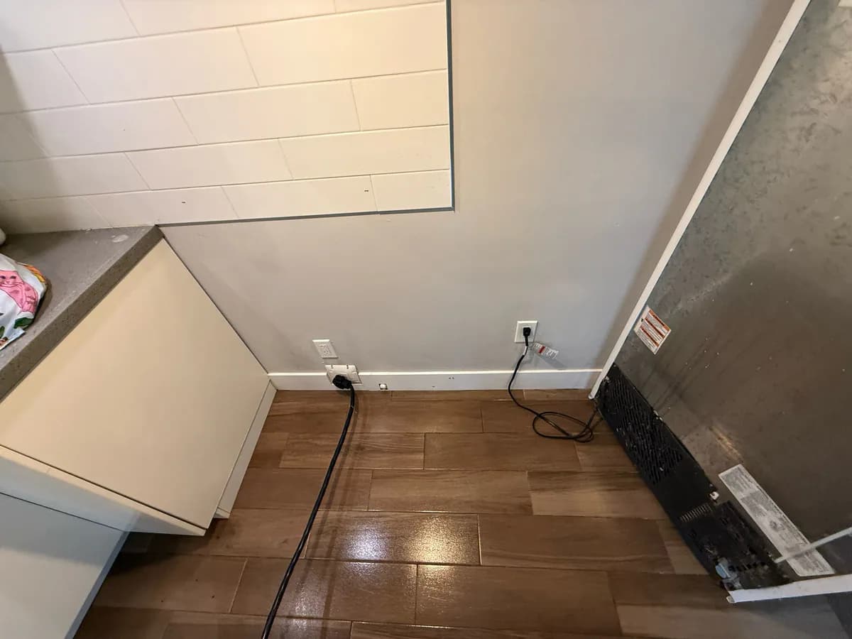 the same floor and reachable wall area after debris and marks were cleaned after NearMe deep cleaning services in Burnaby